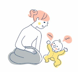 赤ちゃんを抱く母親